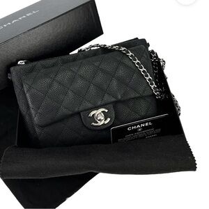 Preloved Chanel Matte Black Caviar Daily Zip Crossbody. Full set with serial.